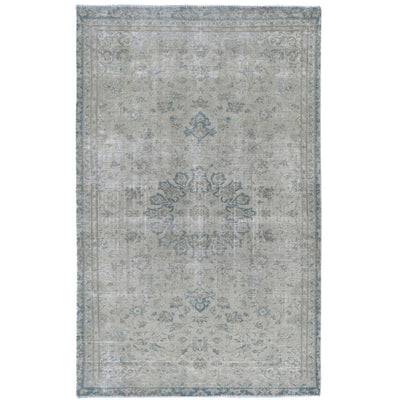 Knotari Heritage Collection vintage hand-knotted wool rug No. A375 with floral medallion design in pale ivory, sky blue, soft gray, taupe, and muted teal, size 5'2" x 8'6".